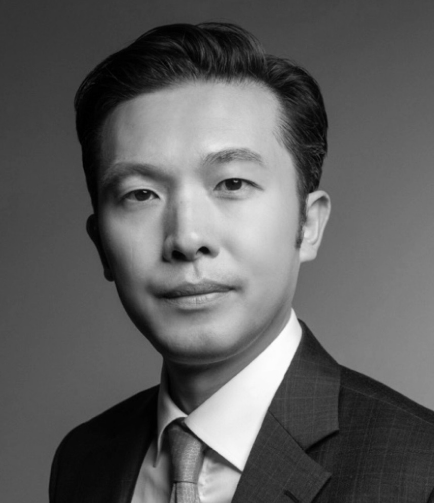 Black and white portrait of Patrick Tsang